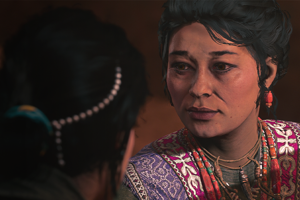 La mentore d’Haroona, Reika, lui sourit.